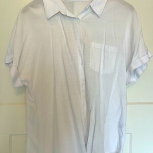 White linen button front blouse.